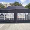 Outdoor tent with windows and doors.