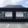 Outdoor party tent with windows.