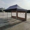 A tent with a window on the side.