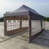 Outdoor pop up tent with windows.