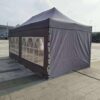 A tent with a large window on the side.