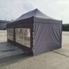 A tent with a large window on the side.