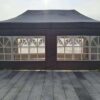 Outdoor party tent with windows.