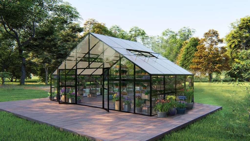 A greenhouse with a wooden deck and plants.