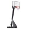 A basketball hoop on a stand with a basketball net.